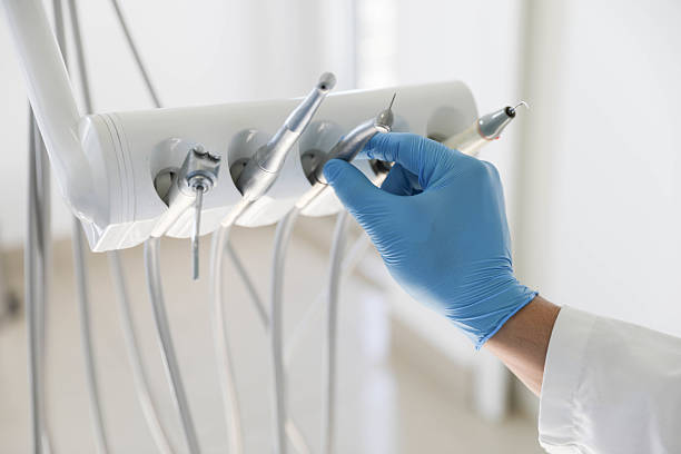 Professional Dental Implants technician working in Old Jamestown, MO